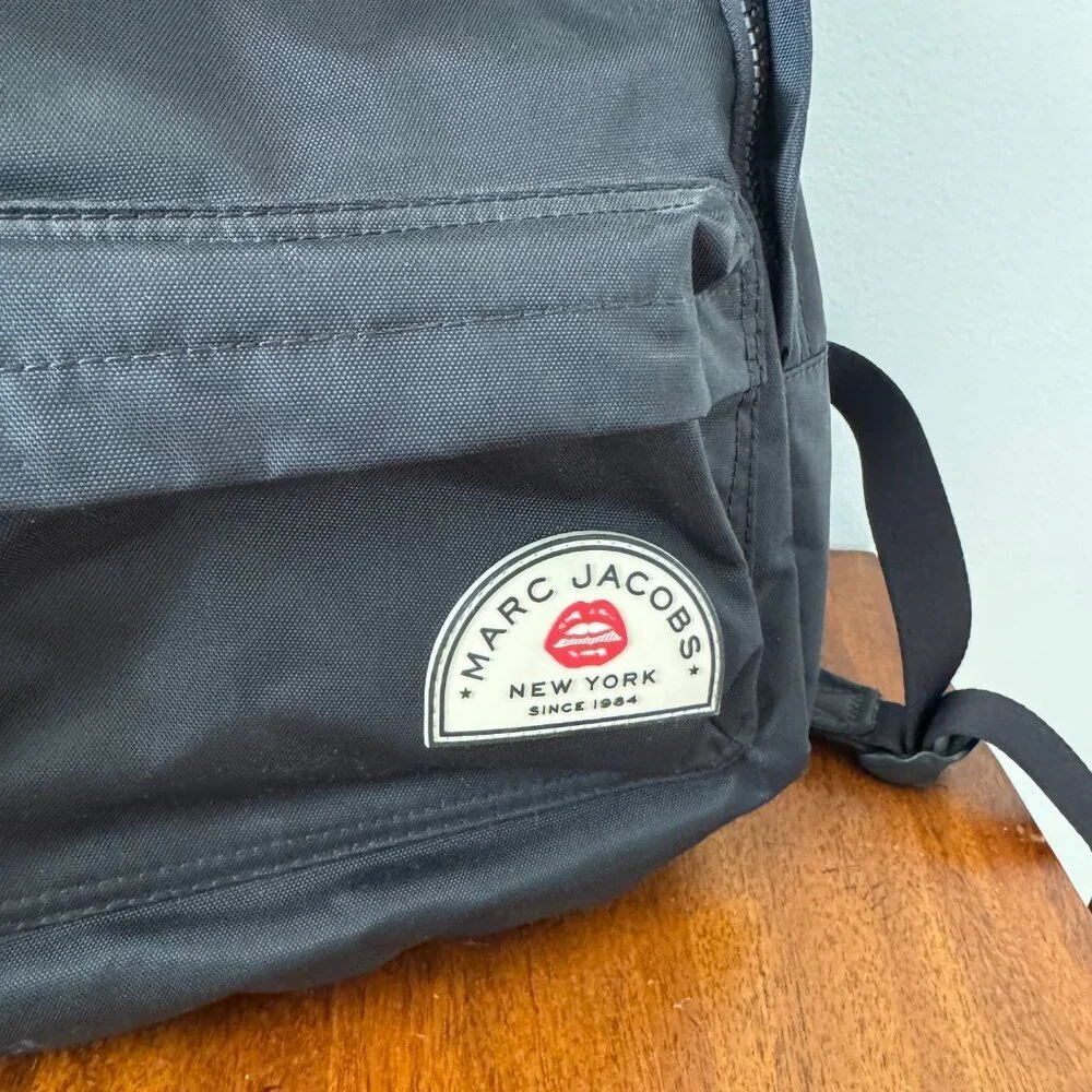 Marc Jacobs Black Backpack with Red Lip Logo Patch